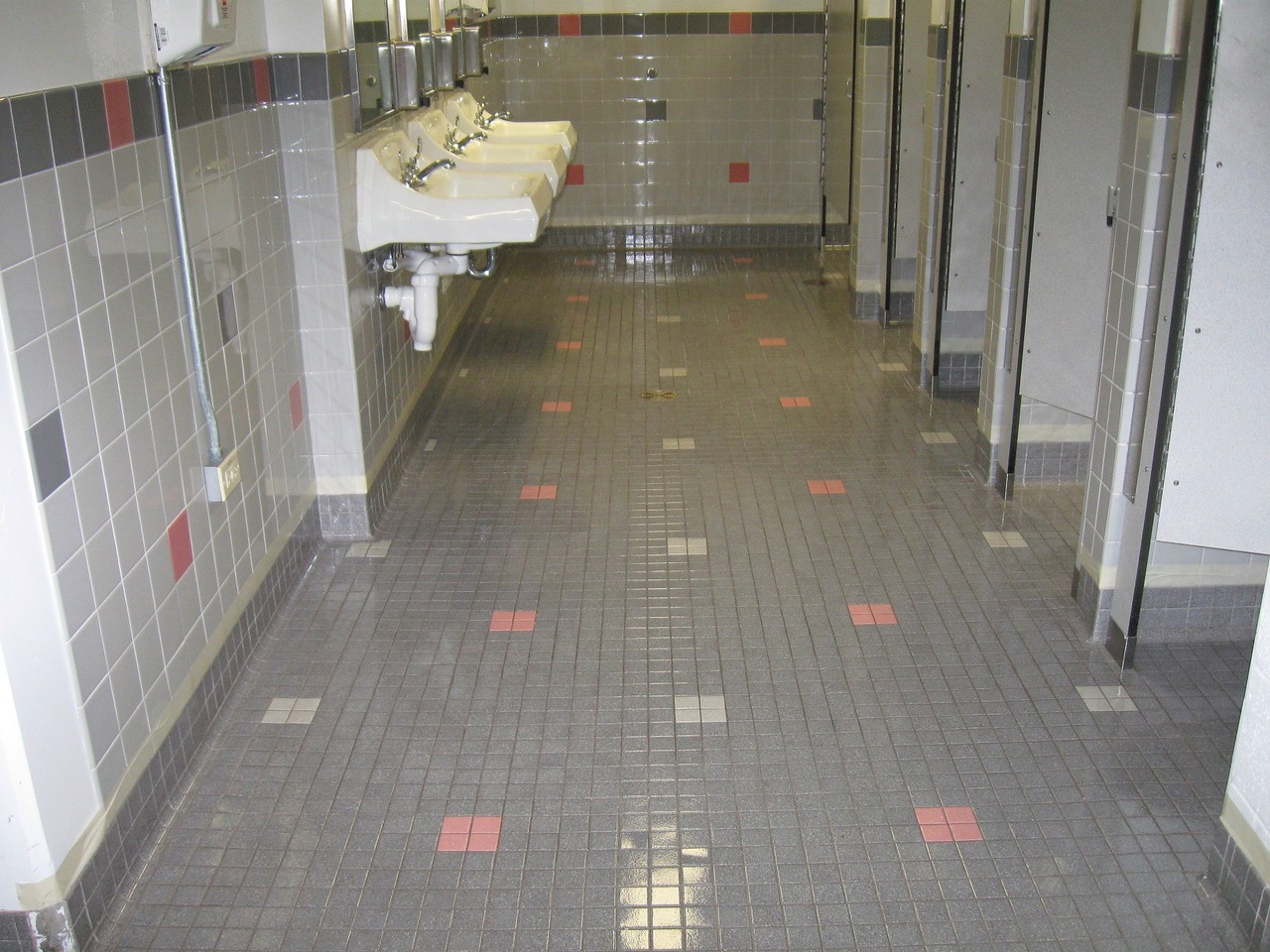 Completed MicroGuard floor coating in an Ewa Makai Middle School restroom