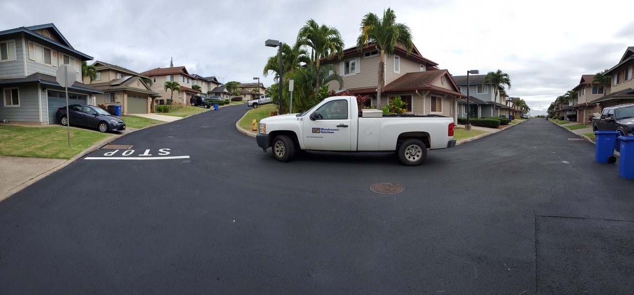 G.P. Maintenance Solutions truck on freshly maintained residential pavement