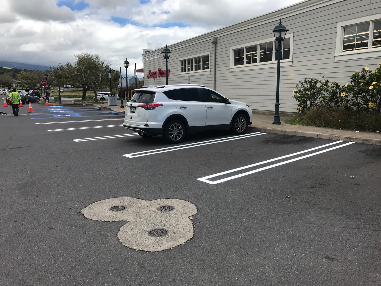 Fresh parking lot striping outside the Pukalani CVS store