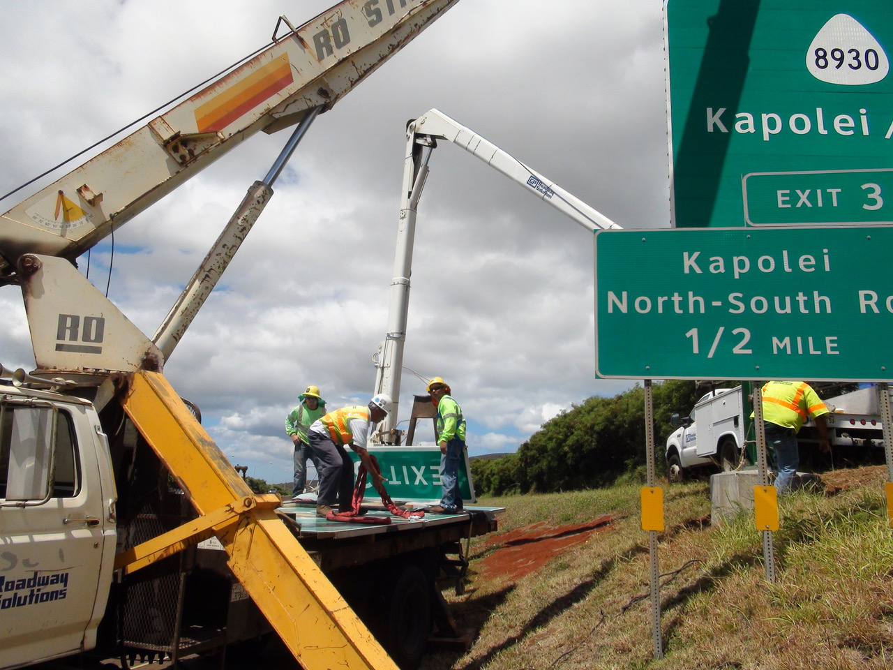 G.P. Roadway Solutions crew installing highway signs near Kapolei