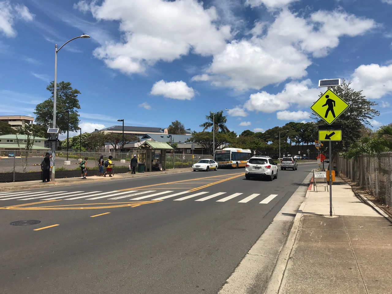 Completed pedestrian crossing and solar-powered warning signs in Hawaii