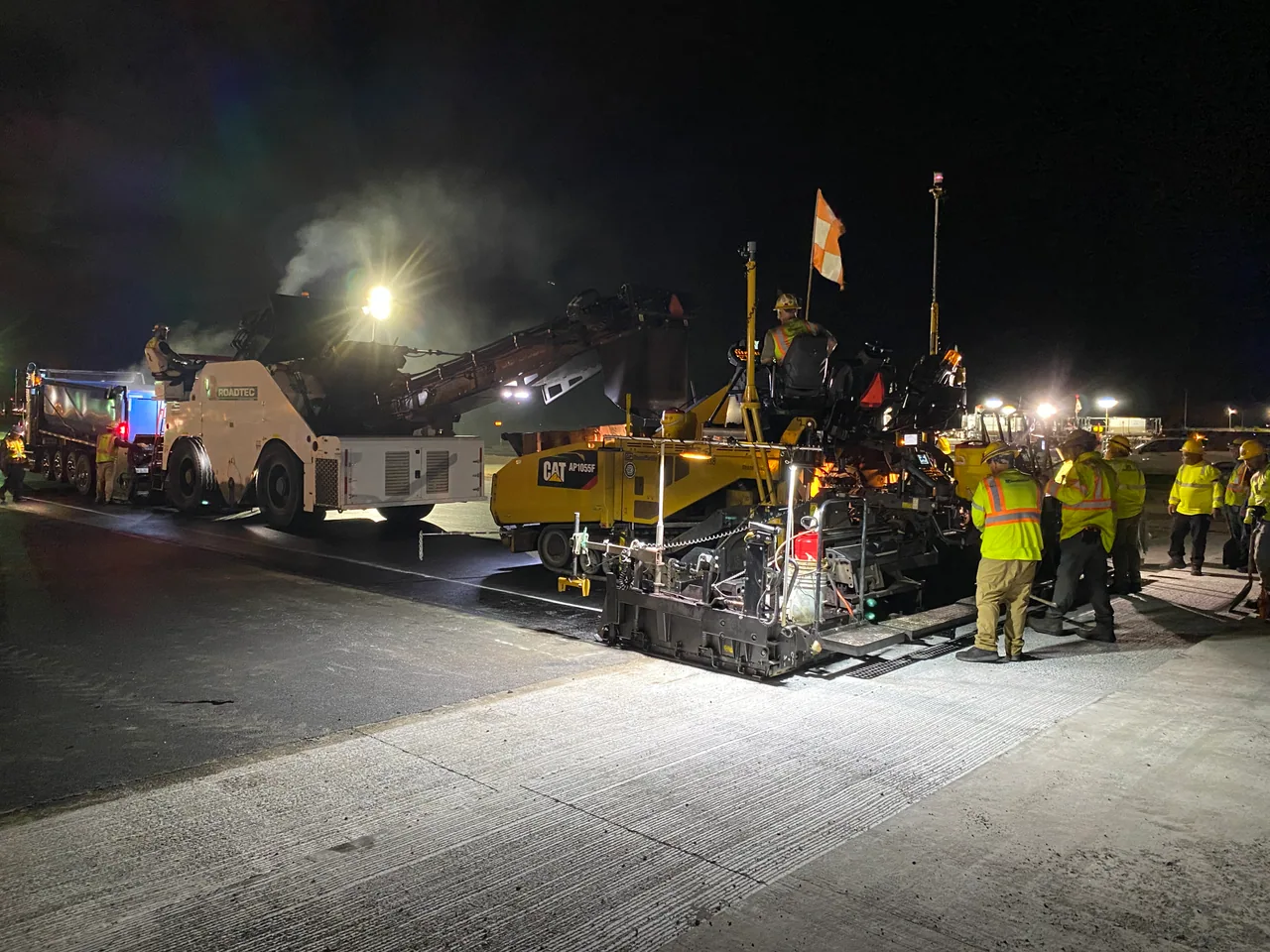 Asphalt paving operations under runway lights
