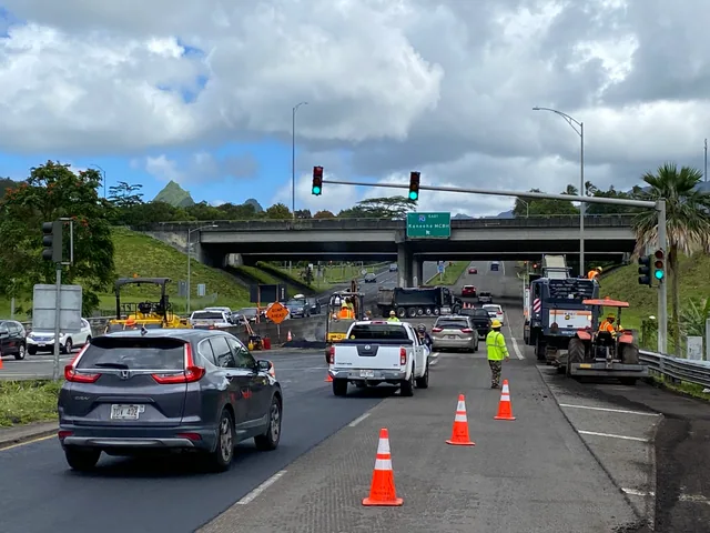Roadway crews working alongside local traffic
